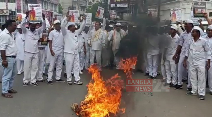 আগরতলায় মোদির কুশপুতুল দাহ