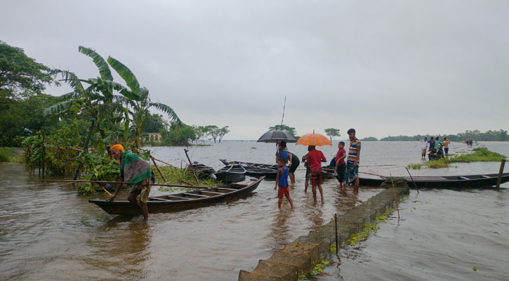 পাহাড়ি ঢল আর ভারী বর্ষণে নেত্রকোনায় বাড়ছে নদ-নদীর পানি