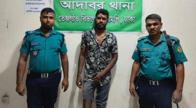 বাসে অগ্নিসংযোগের চেষ্টা, আদাবরে যুবক আটক